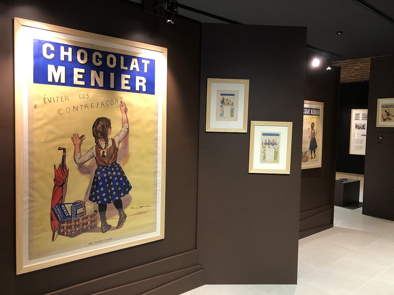 Affiche du Chocolat Meunier prise en photo dans le musée